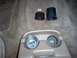 The aftermarket cupholders came from a boating supply store.  They're deeper, and have a slightly wi...