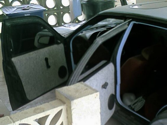 doors-with-interior.jpg Looing at both doors, Never got to finish the interior...Still has the nasty a$$ red Ford interior, i think there still using it today... Fords only draw back...