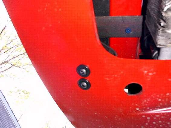 r-ffix3.jpg where the brackets and aluminum angle iron are fastened to the fascia, and the access hole used to drill thru the cross member for the self-tapping screws.