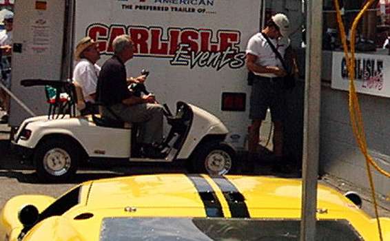 ned.jpg Ned Jarrett, honored guest, sitting on the golf cart....