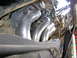 The secondary air pipes are in their correct position, & working, but the downtube to the cats was d...