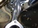 The instructions say to remove the starter, position the header, then install the starter, then bolt...
