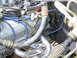 The coil support brace couldn't be reinstalled, but since the dipstick was also loose, its brace was...