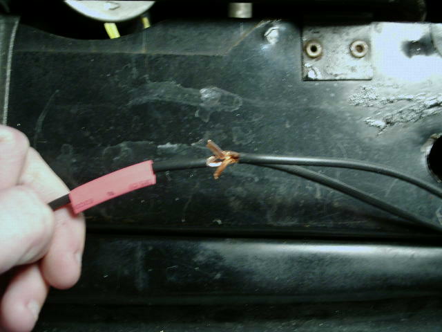 soldering-splice---4.jpg Don't forget to have the heatshrink ready and insert the wire through the hole.