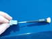 With the connector button on top, insert a thin-bladed screwdriver or pick into the top (rounded) of...