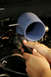 Using one of the provided clamps, loosely attach the elbow to the throttle body.