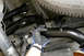 Hang the front exhaust outlet using the stock mount, then thread the nuts onto the studs by hand.