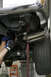 With the pipes hung, bolt the two together and align the tips before tightening the whole system. A ...