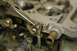 To remove the vacuum secondary, first remove the c-clip attaching the connecting rod to the secondar...