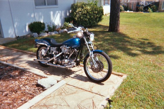 florida-04.jpg repainted in 04, different handlebars, exhaust, misc.