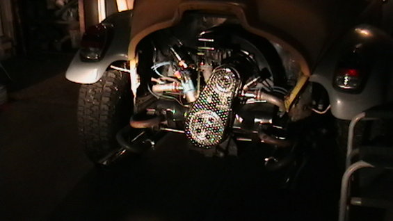 dougs-028.jpg With the carb back on, cage back on the wheels, everything working.