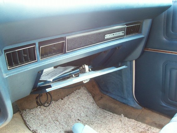 glovebox.jpg The glovebox door is damaged, rivets came out, latch still works but it won't hold it in.  I took the door off and will be looking for another that doesn't have stripped holes for the hinges.  No owner's manual, I'll use my '75 one for now.