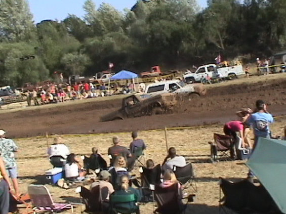 sheridan_mud_drags_-_set_2_028.jpg Now Jim is gaining on me. <br>(6/7/2003)