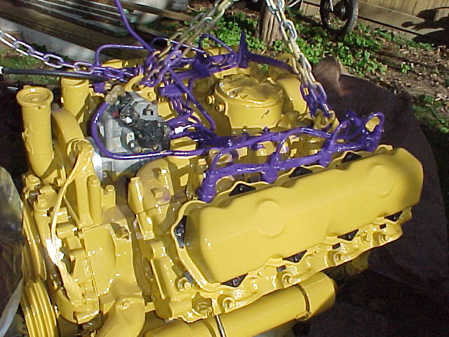 mvc-477f.jpg "AFTER" SHOT.  CATERPILLAR YELLOW AND PURPLE PAINT ON A FORD, OH MY!