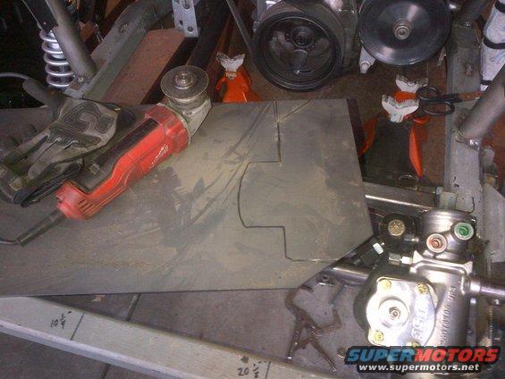 Grinder and metal plate with cut lines