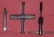 1983 Volkswagen Rabbit - This photo displays specialized tools for automotive starter bushing maintenance, including a bolt, a threaded rod assembly, and a tap wren…