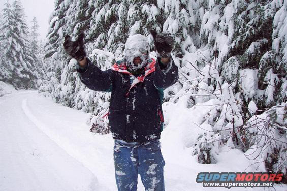 dcp_0445.jpg Rochelle wanted to get back at Jim for throwing her down in the snow, so we tackeld the big bad smokey bear.  (12/27/2003)