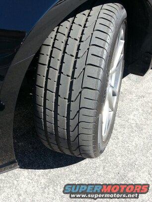 Black tire and silver wheel on a car
