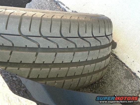 Close-up of a tire tread with visible wear
