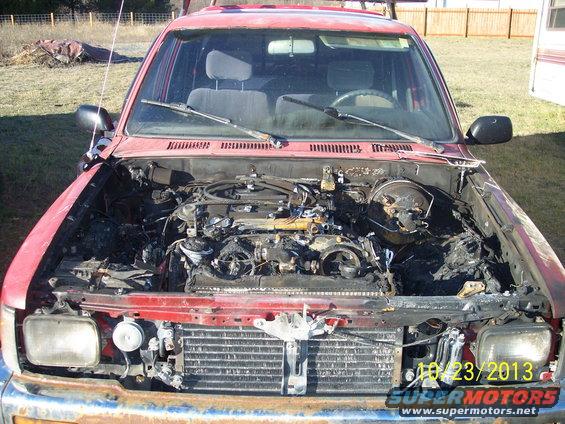 1991 Toyota Pickup/SR5 front view with damaged engine