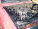 1991 Toyota Pickup/SR5 - Engine compartment of a 1991 Toyota Pickup/SR5 shows significant fire damage.