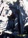 1991 Toyota Pickup/SR5 - The engine bay is heavily damaged by fire, with melted hoses and a charred radiator visible.