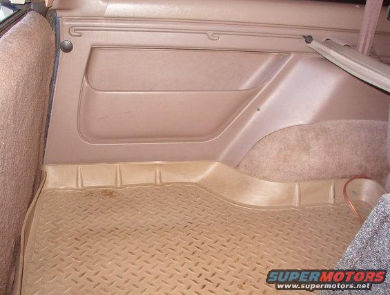 cargocover2.jpg Fully retracted.  Cargo tray is aftermarket, and factory cargo net is missing.