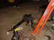 1992 Ford Bronco - A front axle assembly is supported by jack stands in a garage setting.