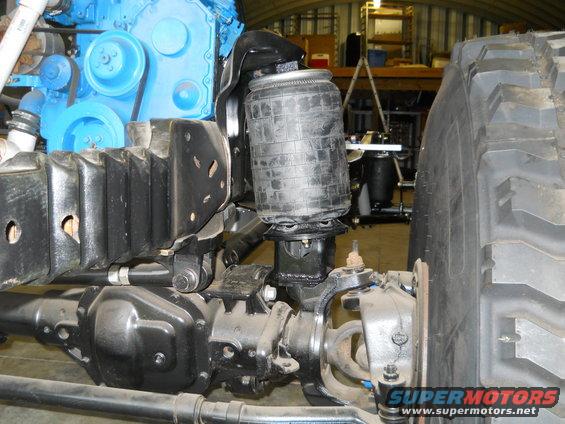 Front suspension part with air bag and large tire