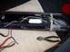 1998 Lincoln Mark VIII - A car's tail light assembly is shown with exposed wiring and a pair of pliers, dated 09/22/2013.