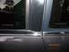 1998 Lincoln Mark VIII - Close-up of a car's side window and door frame, revealing VIN details and a timestamp.