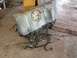 2004 Ford Crown Victoria - This image shows a removed fuel tank and associated lines, likely from a Ford Crown Victoria, as indicated by the registry information.