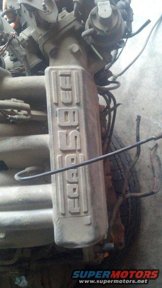Ford 5.8L engine valve cover with raised lettering