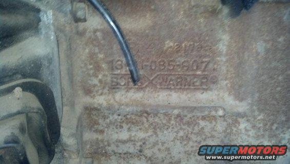 Close-up of a Borg Warner transmission tag with part number 13-095-907