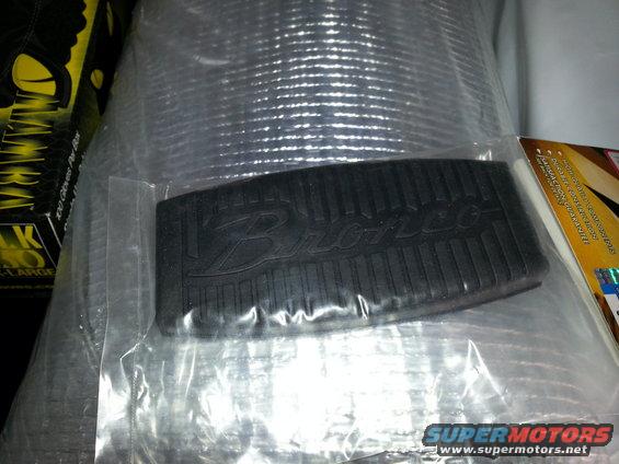 Black rubber pedal pad with embossed 'Bronco' script, still in plastic packaging