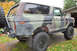 1989 Ford Bronco - This 1978 Ford Bronco is shown from a three-quarter front angle, a camouflage paint scheme and off-road tires.