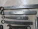 2004 Aston Martin Virage - A collection of various metal wrenches, some with brand names and sizes clearly visible.