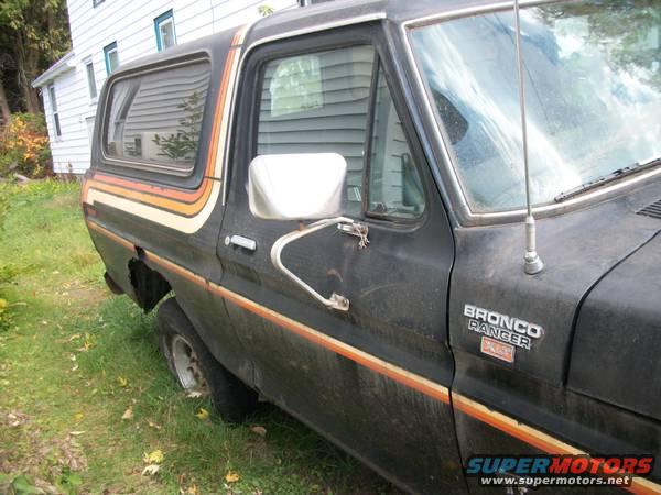 Black 1978 Ford Bronco Ranger with pinstripes, 3/4 front view