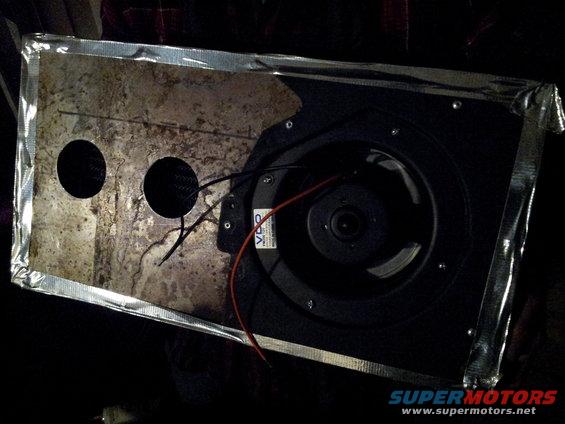 Speaker with two holes and wires, taped edges
