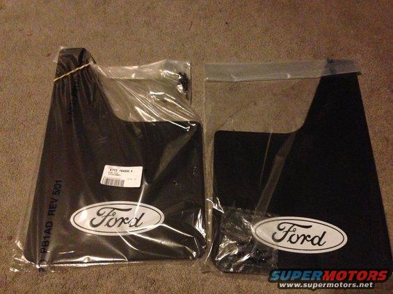 img_13551.jpg Genuine Ford mud flaps. Paid $54.26 on 11/4/2013 for 2 pairs of them. They are part number E7TZ-16A550-A. They measure 18"x12".