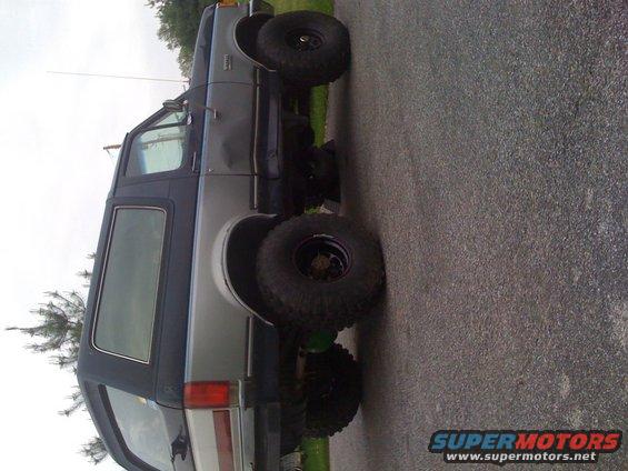 1989 Ford Bronco side view, lifted with large tires