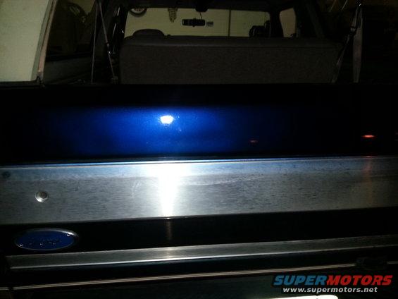 Blue tailgate with chrome trim and Ford emblem, 1994 Ford Bronco