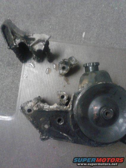 p82a0129.jpg my engine has a special serpentine setup that makes some things really simple but others really complicated. my power steering pump died so I decided to swap to a Saginaw pump. problem is that the bracket prevents my alternator from mounting. my reverse flow waterpump prevents me from mounting it anywhere else

I cut off the A/C mount and notched the other area to mount my alternator there. it seems to work fine other than needing a new belt that's quite abit longer some reason.

II used my arc welder and cranked up the power to cut it. I was out of sawzall bladed and cutoff wheels. the welder did it no problem