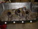 1967 Ford Mustang - Engine block casting with visible cylinder bores and some stamped markings.