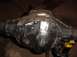 1992 Ford Bronco - A close-up view of a differential housing that has undergone modifications, including welded sections and visible bolts.