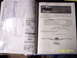 1990 Ford Bronco - This image shows an open document, possibly a manual or build book, with printed text and diagrams.