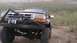 1996 Ford Bronco - This 1996 Ford Bronco is equipped with a winch and brush guard, ready for off-road adventures.