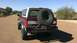 1996 Ford Bronco - Rear view of a 1996 Ford Bronco, a spare tire on the custom bumper.