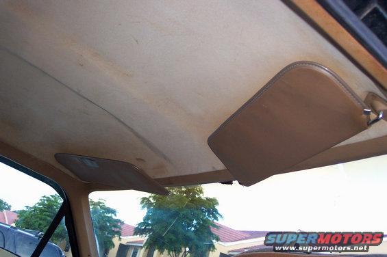 1986 Ford Bronco interior showing headliner and two sun visors