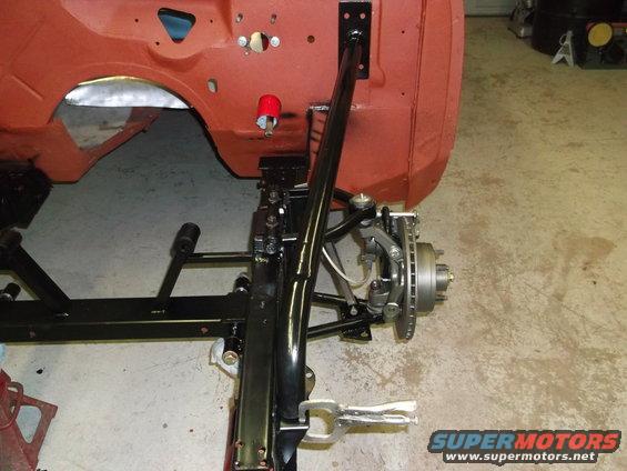 Front suspension and chassis components on a vehicle undergoing restoration